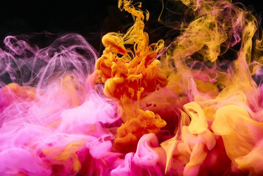 Swirling clouds of colored smoke particles